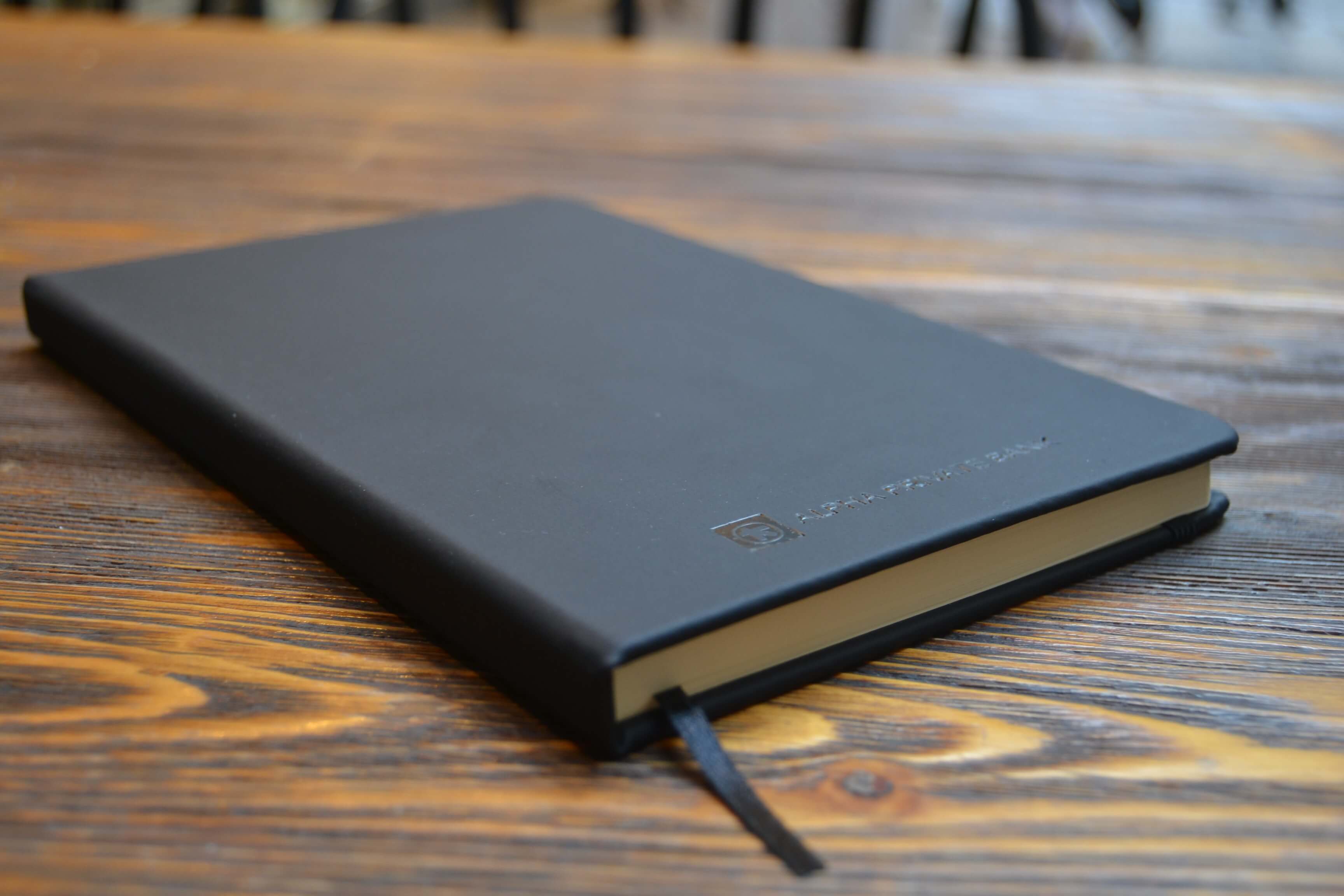 Alpha Notebook black notebook, embossed logo, branded notebooks | Arco Baleno