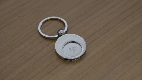 Metal keyring with coin